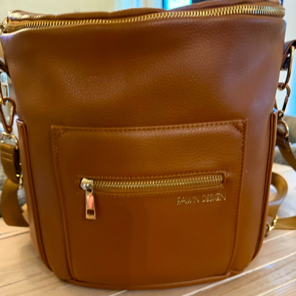 Brand new condition Fawn Design mini backpack in camel brown.